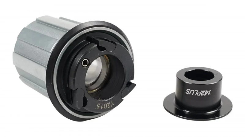 DT Swiss FHB DT SWISS - TA SHIMANO 9/10-SPD ALLOY 3 PAWL W/ 142+ END CAP (HWYABM00L6805C) - Achse - Fahrradteile